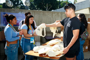 Volunteers handing out supplies